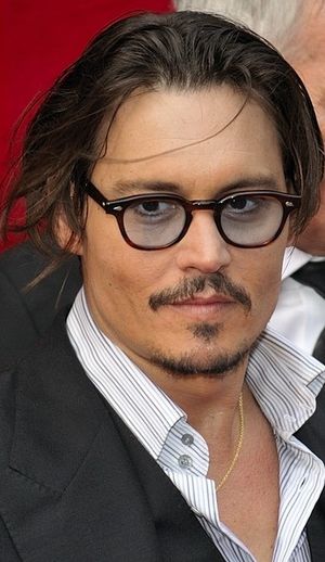 Johnny Depp during the Paris premiere of Publi...